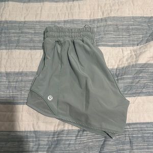 Super cute LULULEMON hotty hot shorts size 2, in a pretty blue/ teal color!! 4”!
